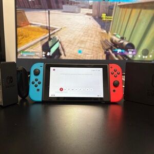 Nintendo Switch Console with Blue and Red Joy-Cons